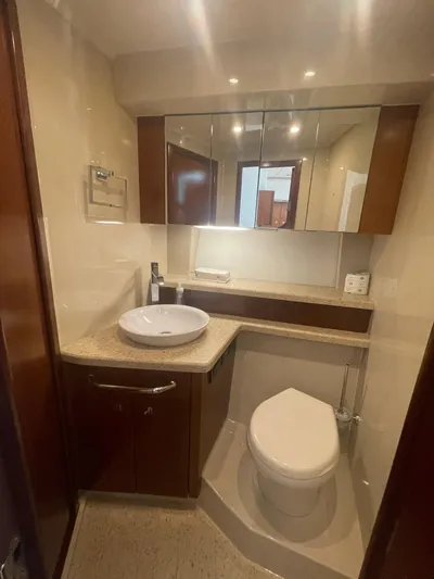 Seaquell Yacht Photos Pics Luxurious bathroom in 2012 Cruisers Yachts 48 Cantius with modern fixtures and elegant design.