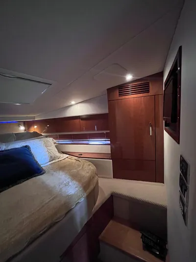 Zingaro Yacht Photos Pics Luxurious cabin interior of 2013 Sea Ray 450 Sundancer yacht with cozy bedding.