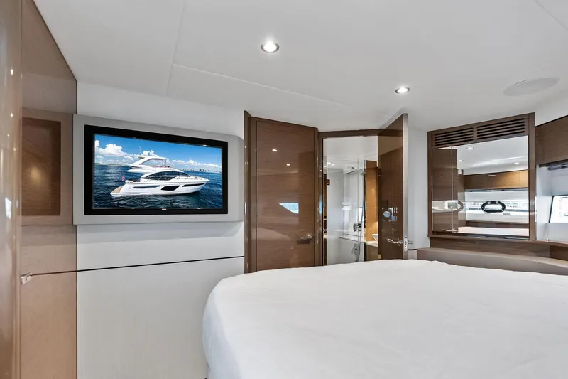 Salty Cowboy Yacht Photos Pics Luxurious interior of 2022 Princess 55 Flybridge yacht with modern amenities and elegant design.