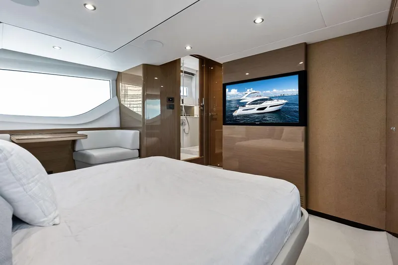 Salty Cowboy Yacht Photos Pics Luxurious interior of 2022 Princess 55 Flybridge yacht with modern amenities.