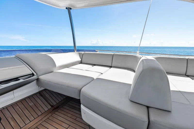 Salty Cowboy Yacht Photos Pics Luxurious seating on 2022 Princess 55 Flybridge yacht with ocean view.