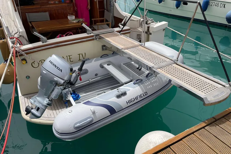  Yacht Photos Pics Cantieri Estensi GOLDSTAR 440 FLY 2004 with Highfield dinghy and Honda outboard motor.