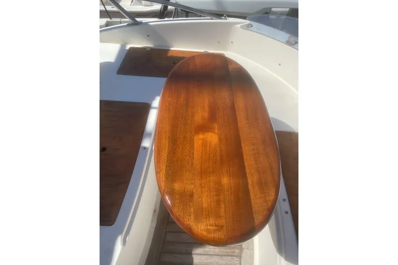  Yacht Photos Pics Polished wooden table on 2004 Cantieri Estensi GOLDSTAR 440 FLY yacht deck.