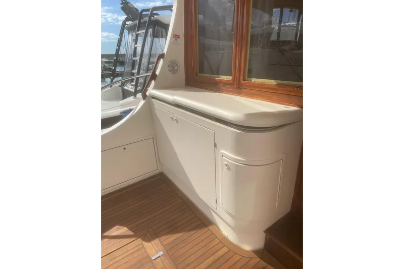  Yacht Photos Pics Interior view of 2004 Cantieri Estensi GOLDSTAR 440 FLY yacht with wooden flooring.