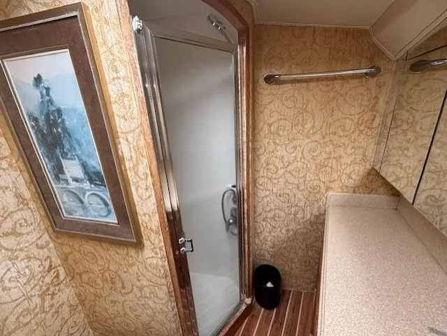  Yacht Photos Pics Luxurious bathroom in 2007 Jersey Cape 44 CNV yacht with shower and elegant decor.