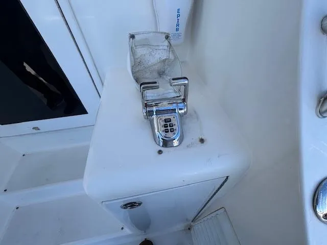  Yacht Photos Pics Control panel on 2007 Jersey Cape 44 CNV boat deck, featuring a keypad and protective cover.