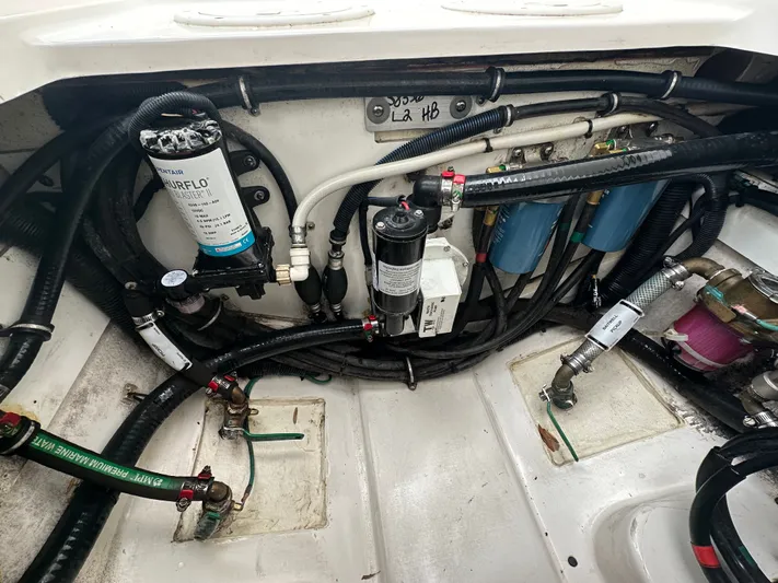 The Bounty Yacht Photos Pics Engine compartment of a 2017 Pursuit S 280 Center Console boat.