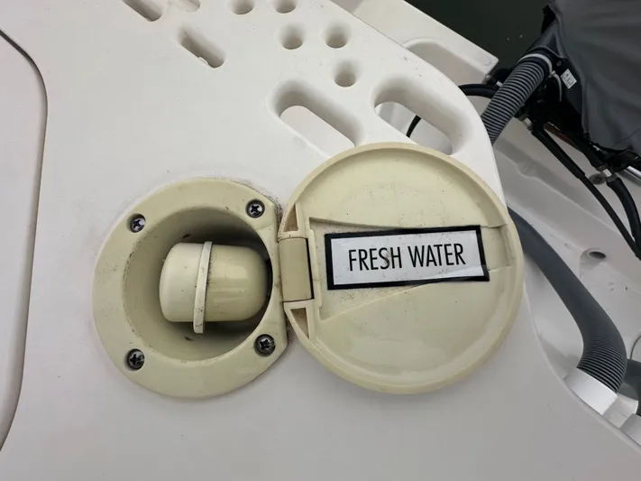 The Bounty Yacht Photos Pics Fresh water inlet on a 2017 Pursuit S 280 Center Console boat.