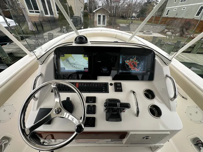 The Bounty Yacht Photos Pics Helm of 2017 Pursuit S 280 Center Console boat.