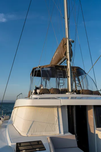 Blureverie Yacht Photos Pics 2021 Bali 4.8 catamaran sailing on open sea under clear blue sky.