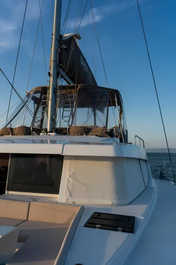 Blureverie Yacht Photos Pics 2021 Bali 4.8 catamaran sailing on open sea at sunset.