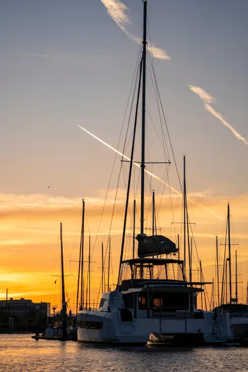 Blureverie Yacht Photos Pics Sailing yacht Bali 4.8 at sunset in marina, 2021 model.