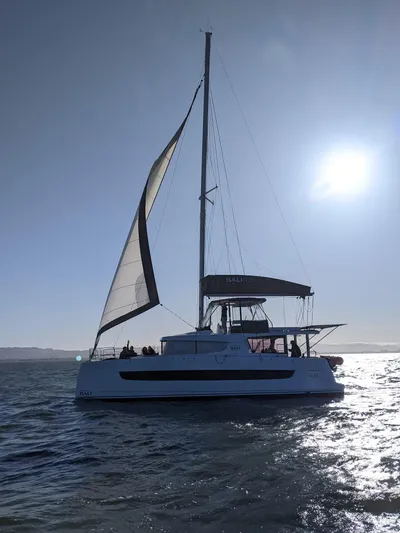 Blureverie Yacht Photos Pics Sailing catamaran Bali 4.8, 2021 model, gliding on sunlit waters.