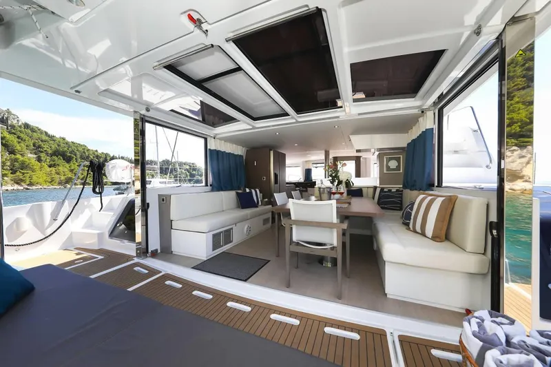 Blureverie Yacht Photos Pics Luxurious Bali 4.8 yacht interior with spacious seating, dining area, and scenic ocean view.
