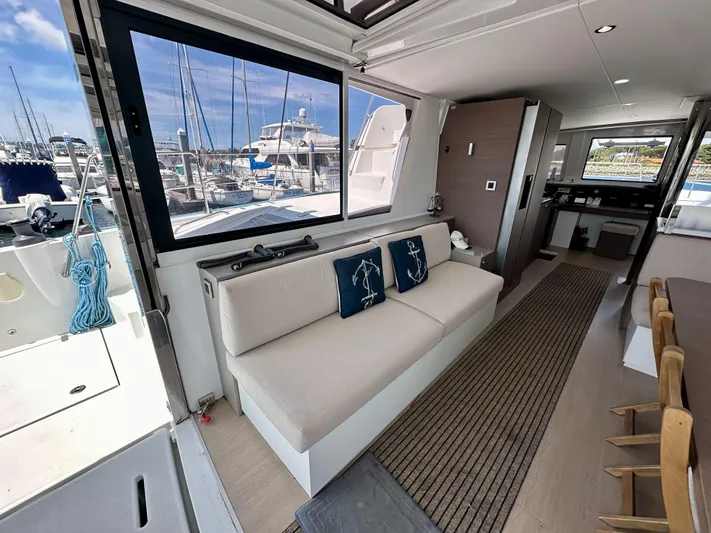 Blureverie Yacht Photos Pics Modern interior of 2021 Bali 4.8 yacht with marina view.
