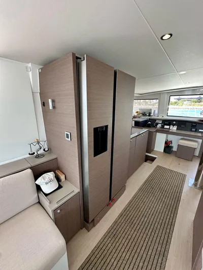Blureverie Yacht Photos Pics Modern interior of 2021 Bali 4.8 yacht with sleek kitchen and seating area.