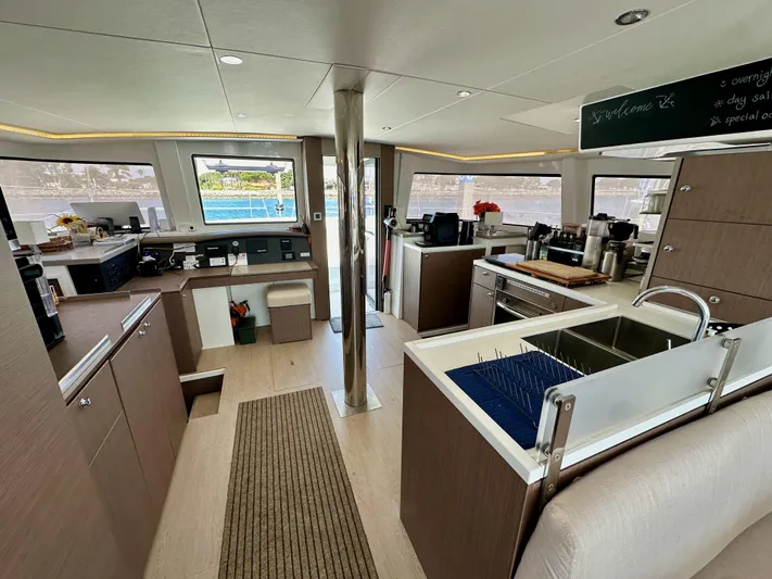 Blureverie Yacht Photos Pics Modern interior of 2021 Bali 4.8 yacht with spacious kitchen and dining area.