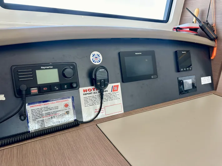 Blureverie Yacht Photos Pics Control panel of a 2021 Bali 4.8 yacht with navigation and communication equipment.