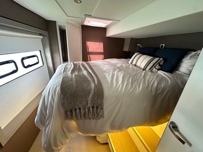 Blureverie Yacht Photos Pics Cozy bedroom in 2021 Bali 4.8 yacht with modern decor and natural light.