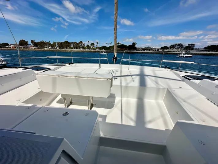 Blureverie Yacht Photos Pics Bali 4.8 catamaran deck, 2021 model, with ocean view and clear blue sky.