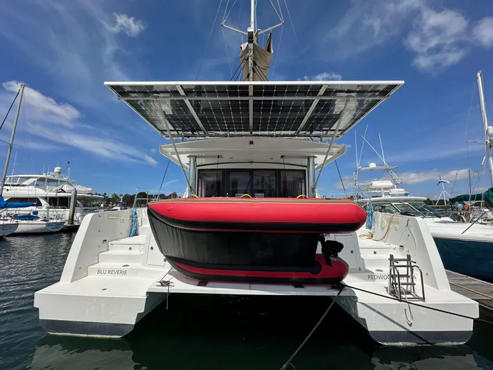 Blureverie Yacht Photos Pics 2021 Bali 4.8 catamaran with solar panels docked at marina.