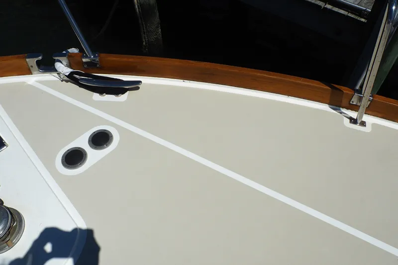 "bootlegger"-repowered Yacht Photos Pics Deck of 1995 Grand Banks 38 Eastbay EX with cleat and railing.