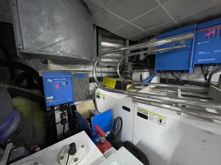 Tmr Yacht Photos Pics Industrial control room with blue electrical panels and wiring, Custom 84 model, 2018.