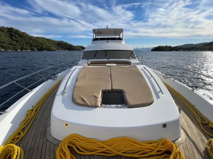 Tmr Yacht Photos Pics Luxurious 2018 Custom 84 yacht on serene waters, featuring spacious deck and scenic views.