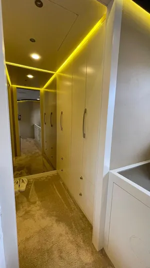 Tmr Yacht Photos Pics Modern RV interior hallway with sleek cabinets and ambient lighting, Custom 84 model, 2018.