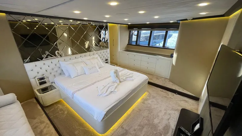 Tmr Yacht Photos Pics Luxurious yacht bedroom with elegant decor, custom lighting, and panoramic windows, 2018 model.