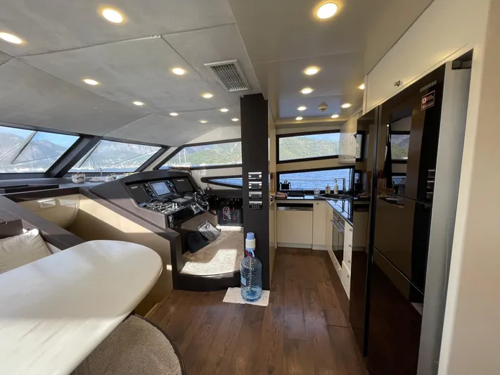 Tmr Yacht Photos Pics Luxurious yacht interior with modern kitchen and helm, Custom 84 model, 2018.