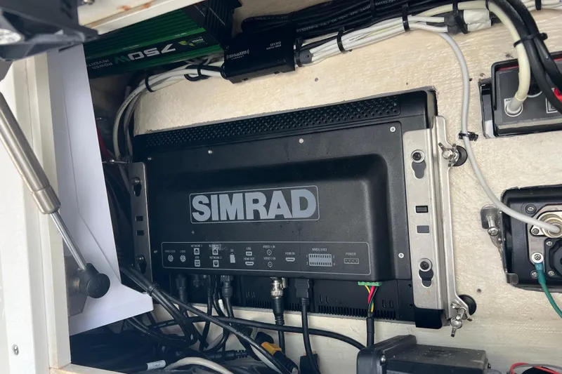  Yacht Photos Pics Simrad marine electronics installed in a 2015 SeaVee 390Z boat, showcasing wiring and connections.