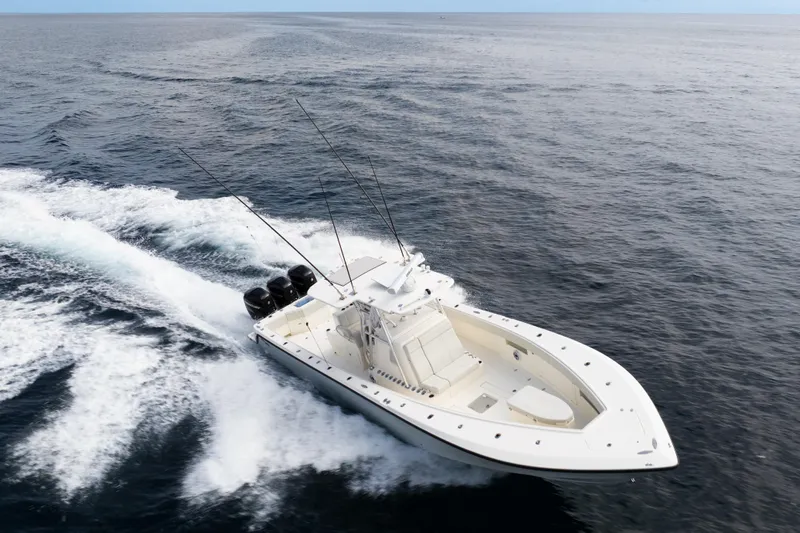  Yacht Photos Pics 2015 SeaVee 390Z boat cruising on open ocean waters.