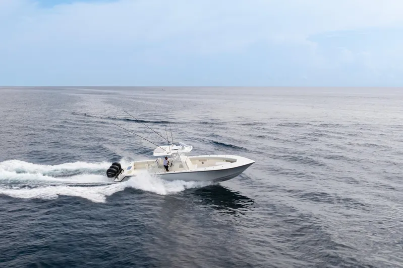  Yacht Photos Pics 2015 SeaVee 390Z boat cruising on open ocean waters.