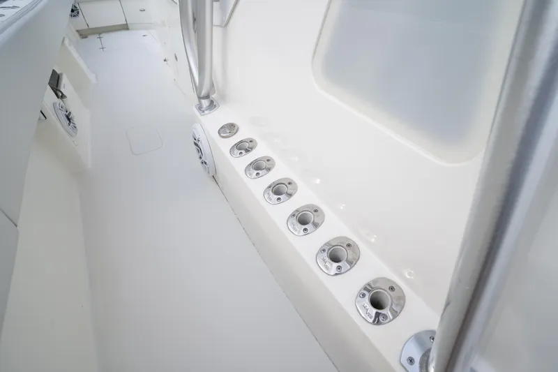 Yacht Photos Pics 2015 SeaVee 39Z boat interior with rod holders and sleek white design.