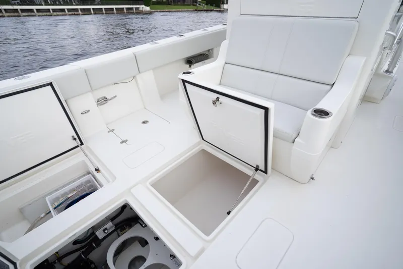 Yacht Photos Pics 2015 SeaVee 39Z boat interior with open storage compartments and cushioned seating.