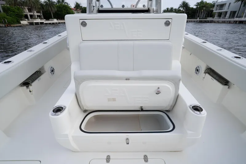  Yacht Photos Pics 2015 SeaVee 39Z boat interior with white seating and storage compartment.