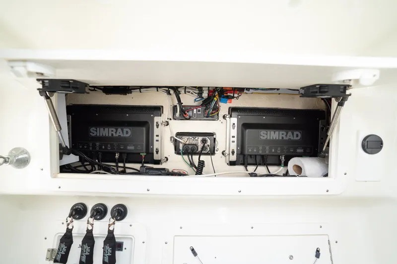  Yacht Photos Pics 2015 SeaVee 39Z boat electronics compartment with Simrad navigation systems.
