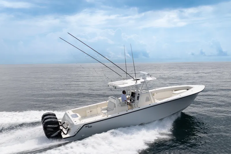  Yacht Photos Pics 2015 SeaVee 39Z boat cruising on open water under a clear blue sky.