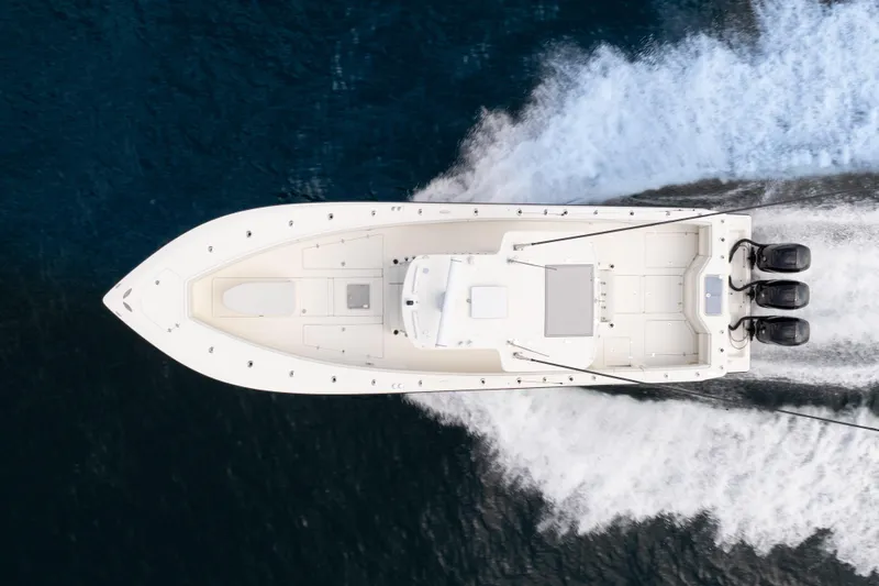  Yacht Photos Pics Aerial view of 2015 SeaVee 39Z boat cruising on open water.