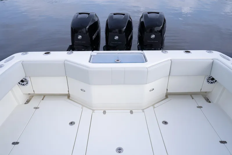  Yacht Photos Pics 2015 SeaVee 39Z boat with four Mercury outboard engines, spacious deck, and seating area.