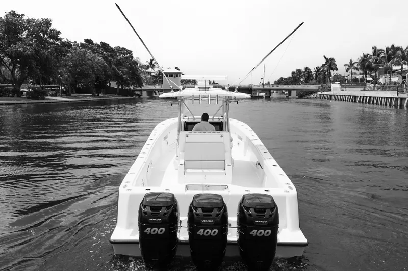  Yacht Photos Pics 2015 SeaVee 39Z boat with triple 400 engines cruising on a scenic waterway.