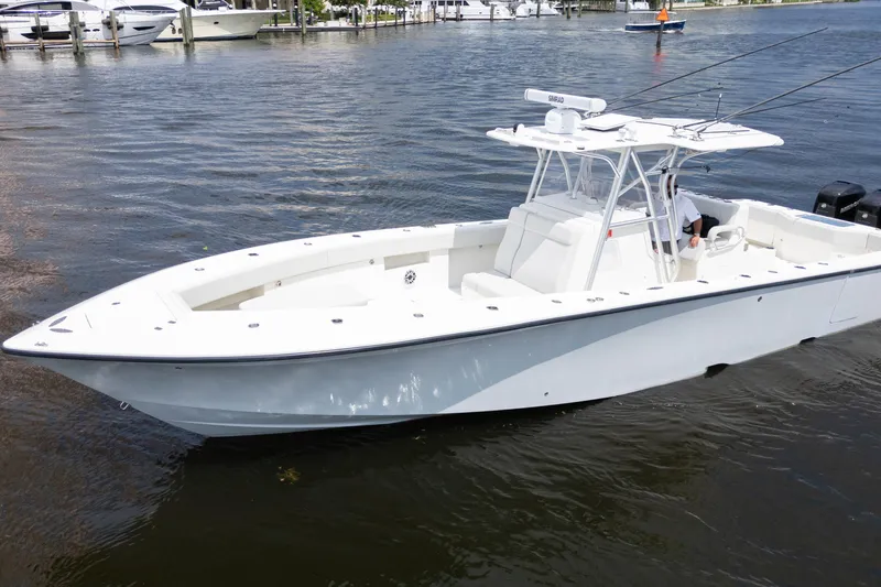  Yacht Photos Pics 2015 SeaVee 39Z boat on calm water, featuring sleek design and spacious deck.