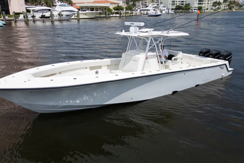  Yacht Photos Pics 2015 SeaVee 39Z boat on water, featuring sleek design and multiple outboard engines.