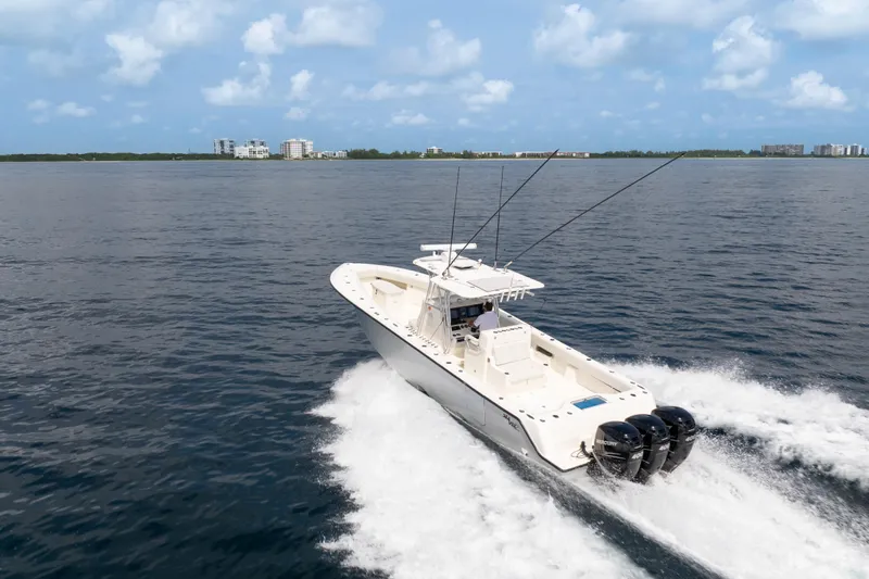  Yacht Photos Pics 2015 SeaVee 39Z boat cruising on open water under a clear sky.