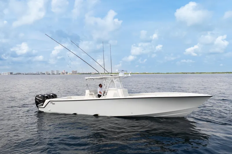  Yacht Photos Pics 2015 SeaVee 39Z boat on calm ocean with clear blue sky.