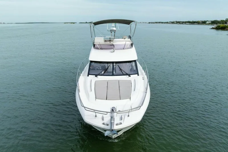 So Fly Yacht Photos Pics 2022 Prestige 420 yacht cruising on calm waters, front view.