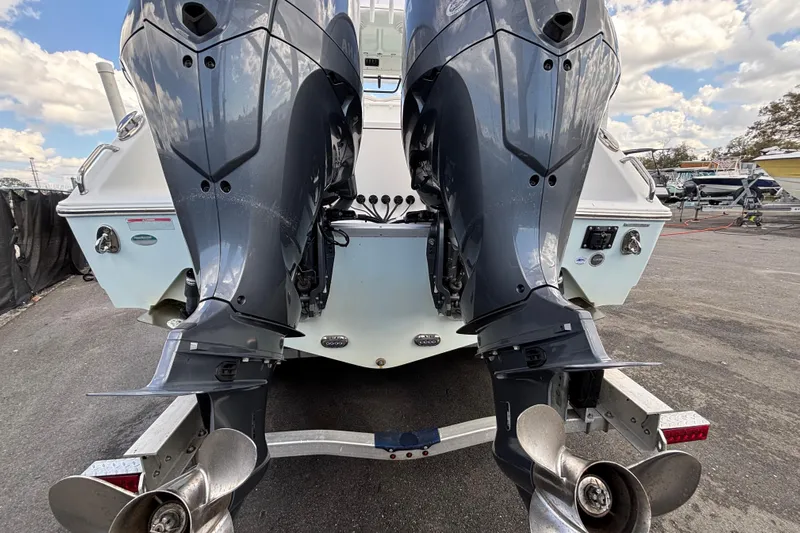  Yacht Photos Pics 2018 Sea Hunt Gamefish 30 with dual outboard motors on a trailer.