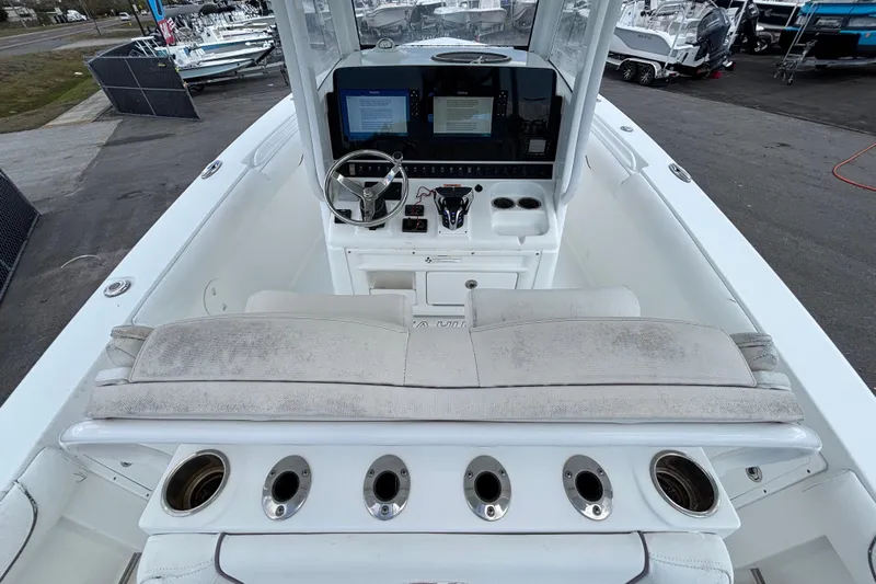  Yacht Photos Pics 2018 Sea Hunt Gamefish 30 boat interior with forward seating and control panel.