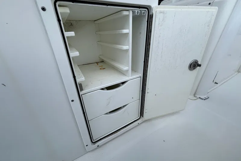  Yacht Photos Pics Open storage compartment on 2018 Sea Hunt Gamefish 30 Forward Seating boat.